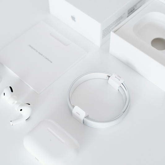 White wireless earbuds on a white background