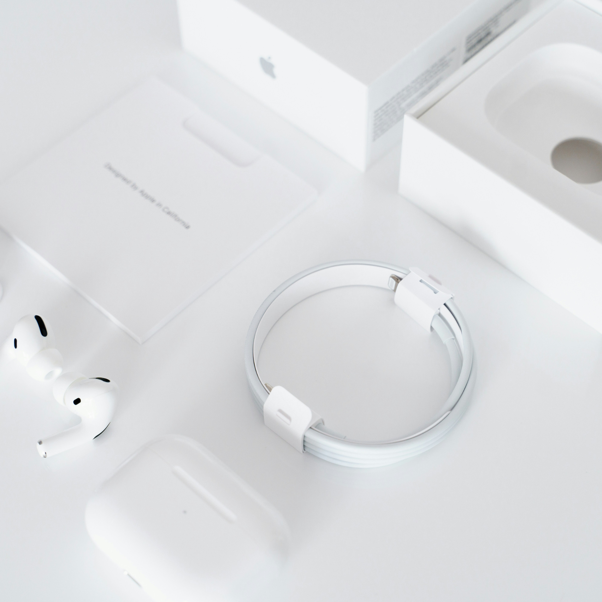 White wireless earbuds on a white background